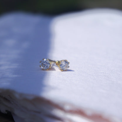18ct yellow gold and diamond stud earrings pictured on white in The Cotswold's. Handmade fine jewellery by Madeleine.