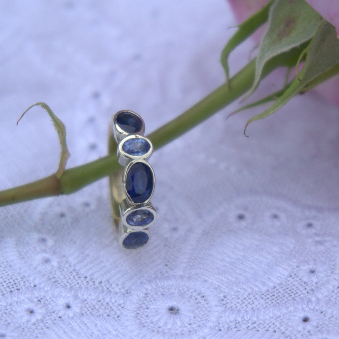 sapphire engagement ring band, on a rose 