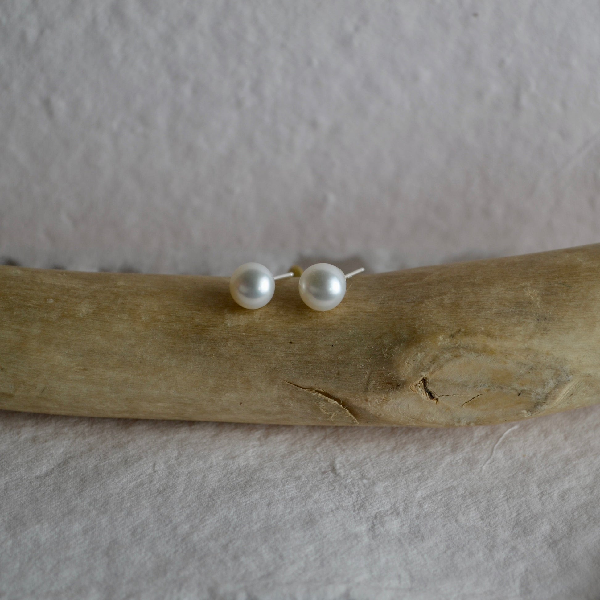 pearl earrings on branch