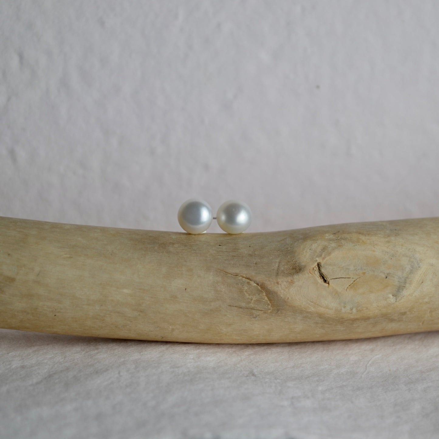 pearl studs, white on branch