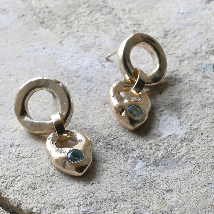 gold aquamarine drops on cotswold stone